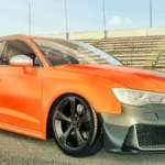 veículo na cor laranja estacionado em uma quadra representando seguro audi rs3