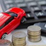 Seguro Chery Arrizo 6 representado por um carrinho com moedas e uma chave.