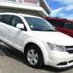 Dodge Journey na cor branca. Falando sobre o seguro Dodge Journey.